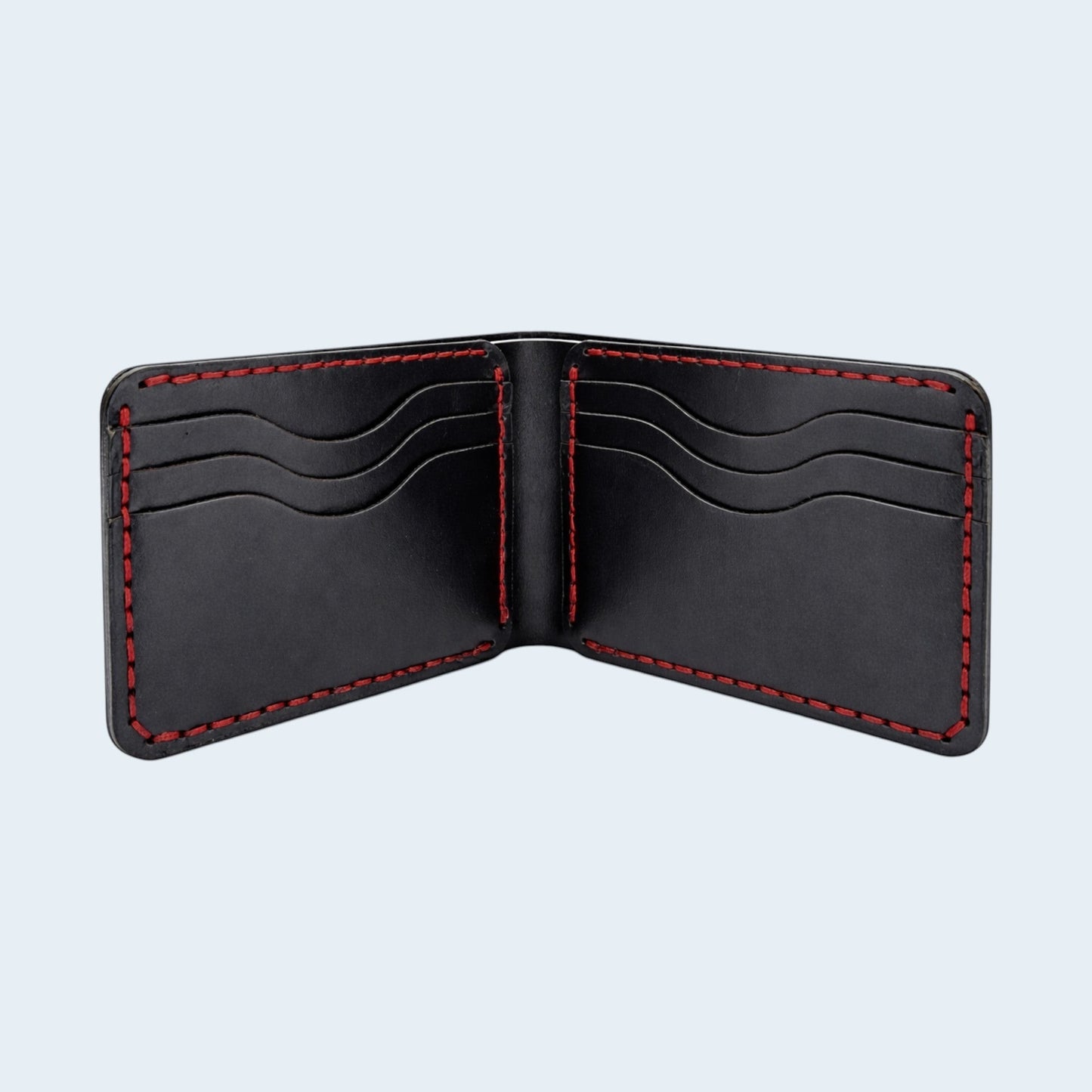 U&E Leather handcrafted black bifold wallet with contrasting red hand-stitched detailing and multiple card slots.