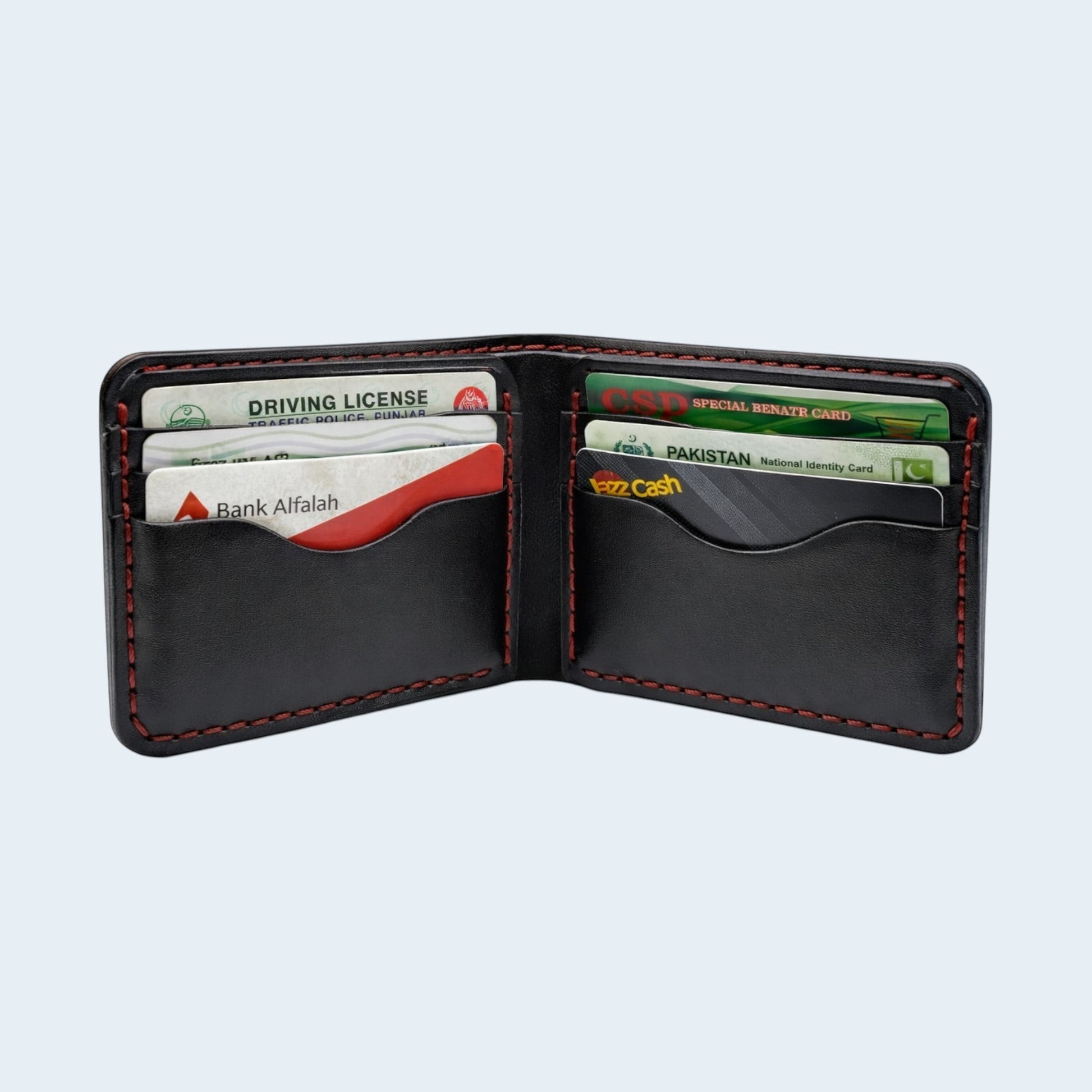 U&E Leather handcrafted black leather bifold wallet with red hand-stitched detailing and multiple card slots.